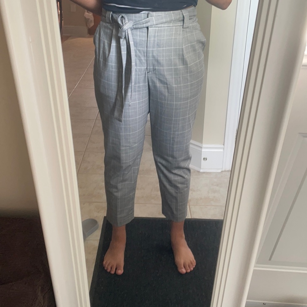 Women’s high waist dress pants with tie belt.